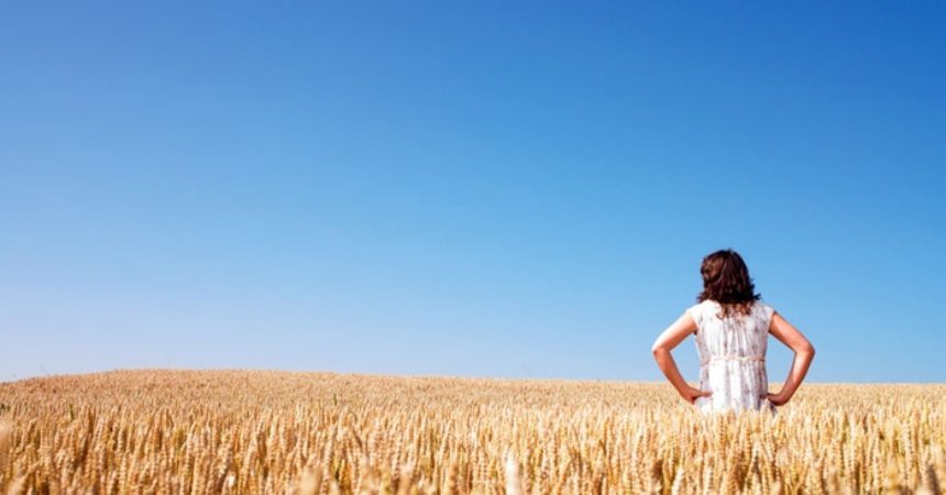 woman-standing-in-field-860x450_c